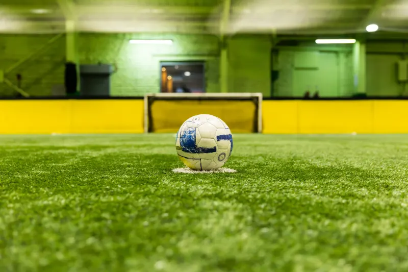 A football on the pitch at Frame 2 Complex