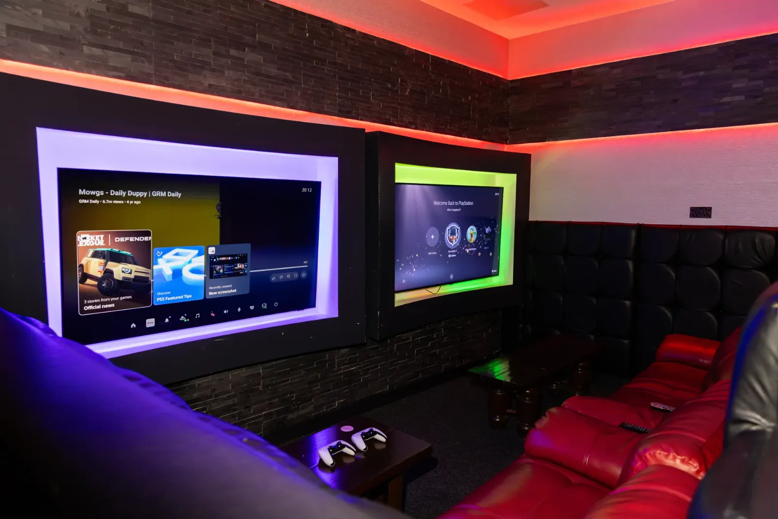 A leisure room with a big screen at Frame 2 Complex