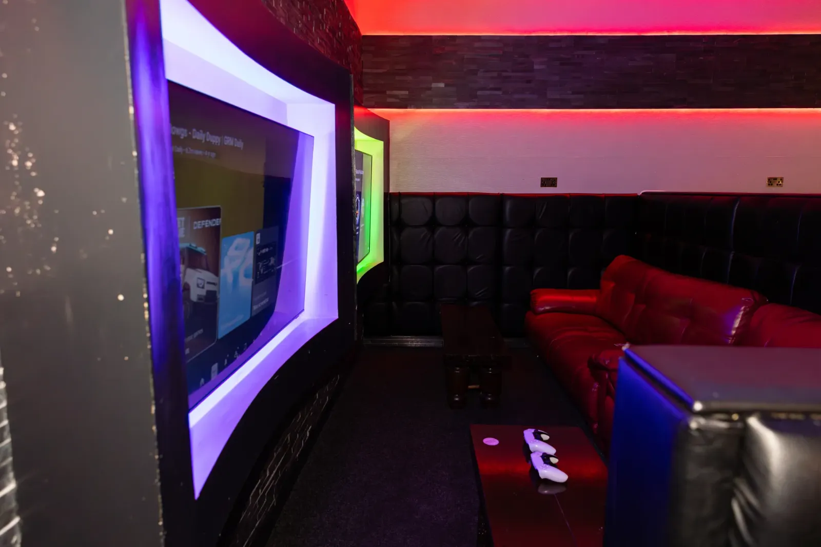 A big screen in a leisure room at Frame 2 Complex
